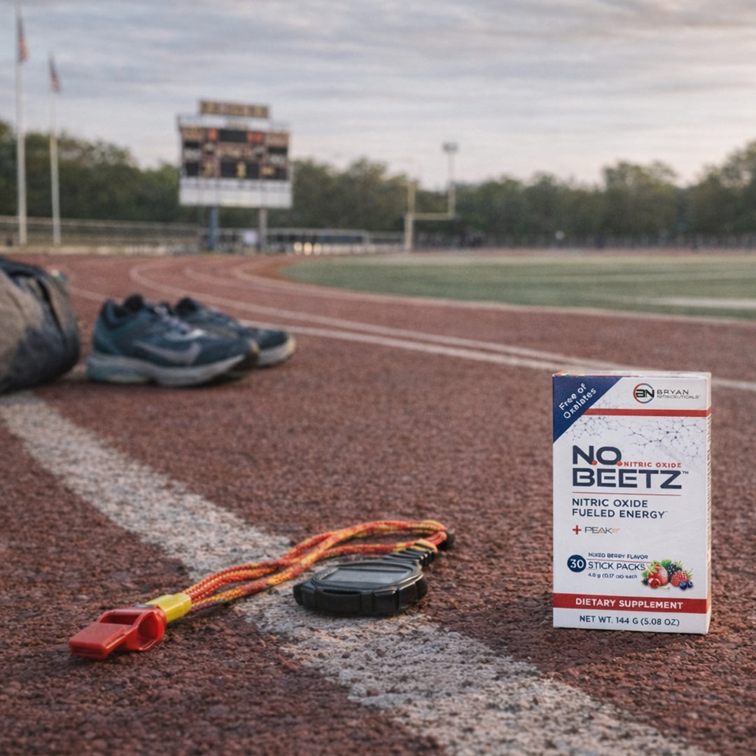 N.O. BEETZ supplement box on a track with running shoes and a lanyard.