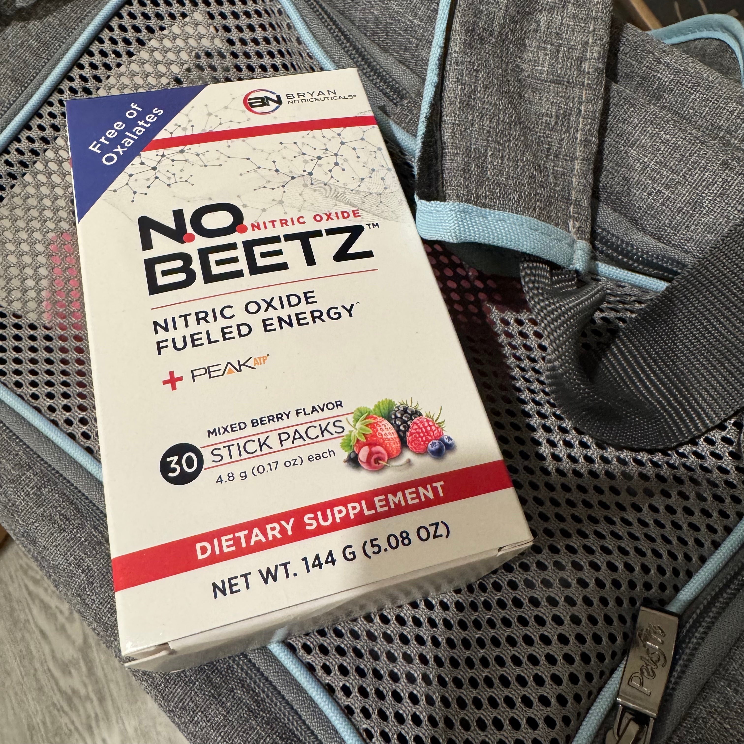 Box of NO BEETZ dietary supplement on a textured bag surface