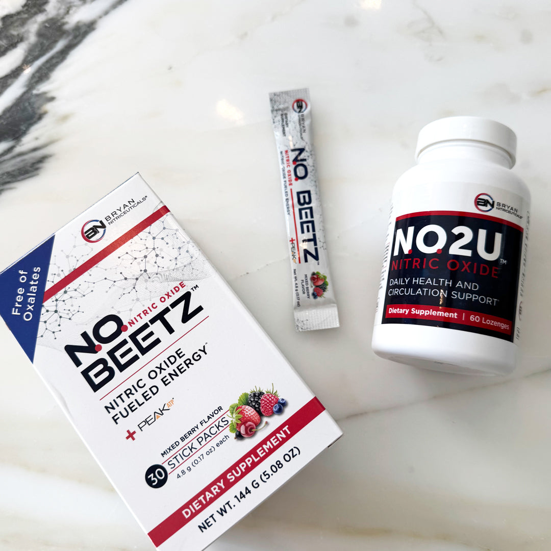 NO2U and N.O. Beetz supplement products on a marble surface