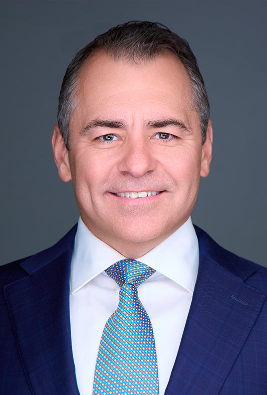 Health science expert Dr. Nathan Bryan in professional portrait, representing longevity research, cardiovascular health, and wellness leadership.